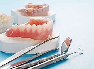 closeup of full denture on table