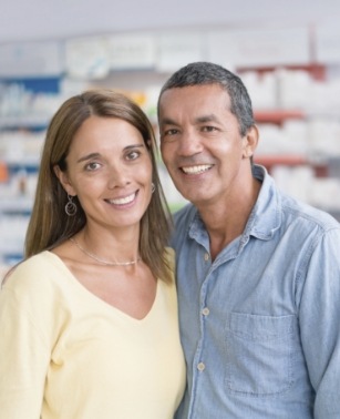 Man and woman smiling together in a store