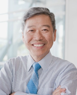Smiling older man in dress shirt and tie