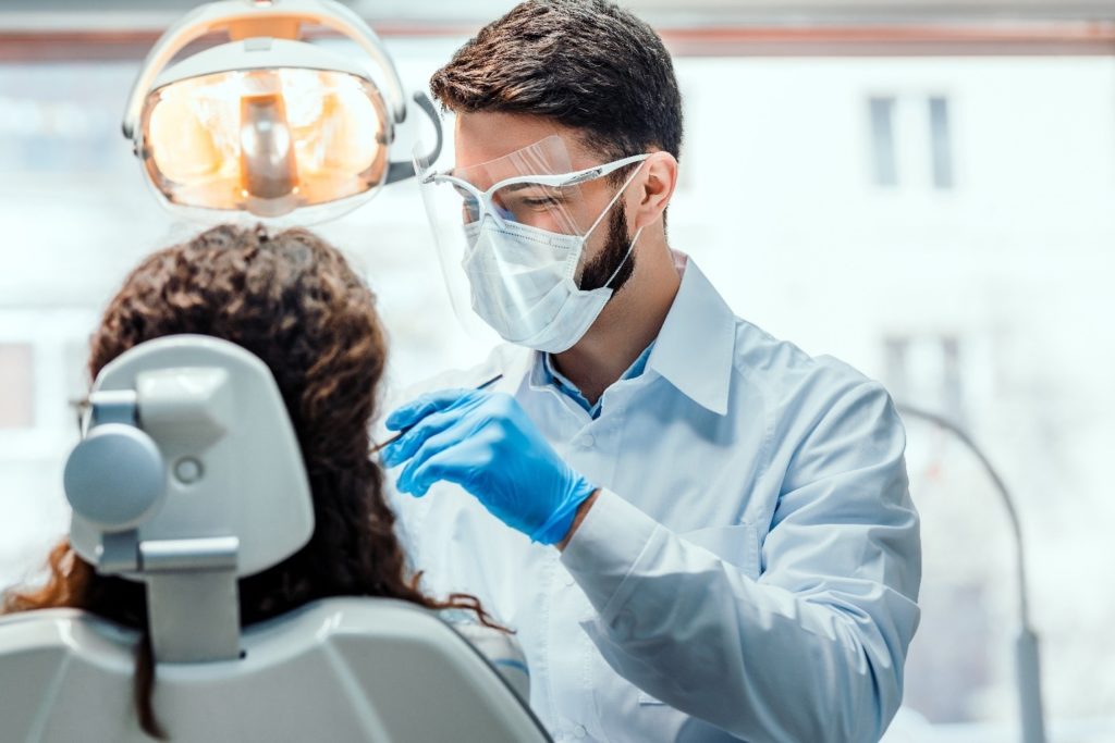 patient getting dental emergency treated