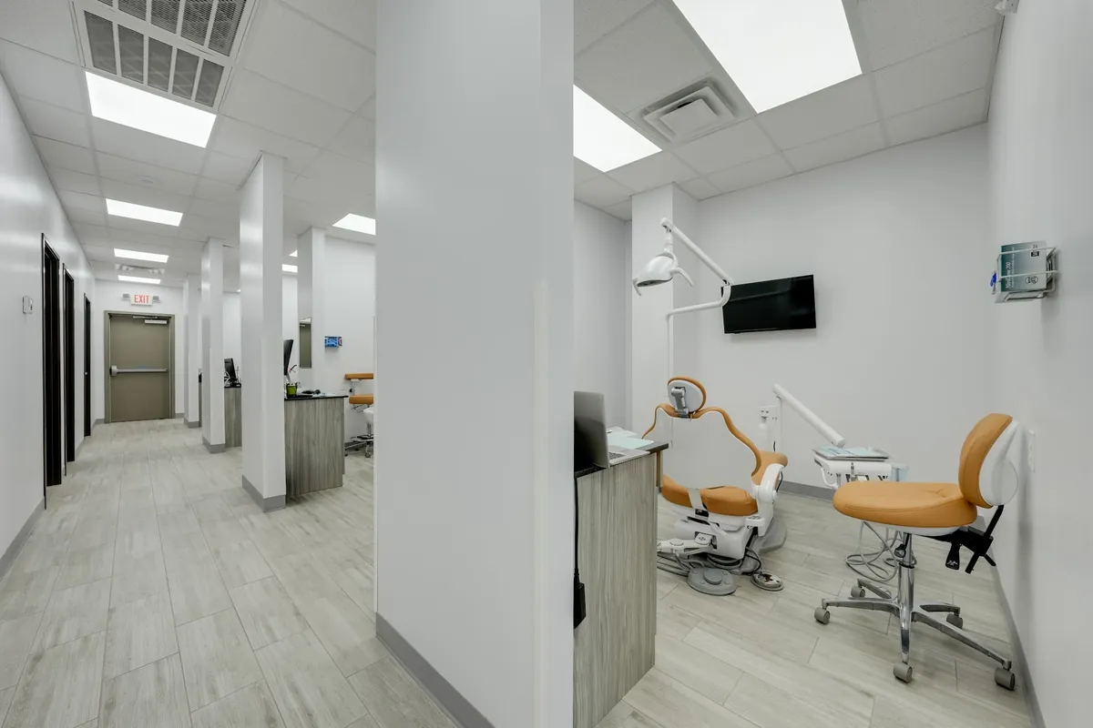 Hallway and treatment rooms inside Sonria Dentista Arlington
